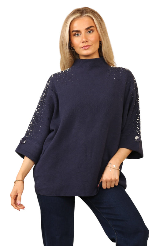 Fine knit and perl arm design top